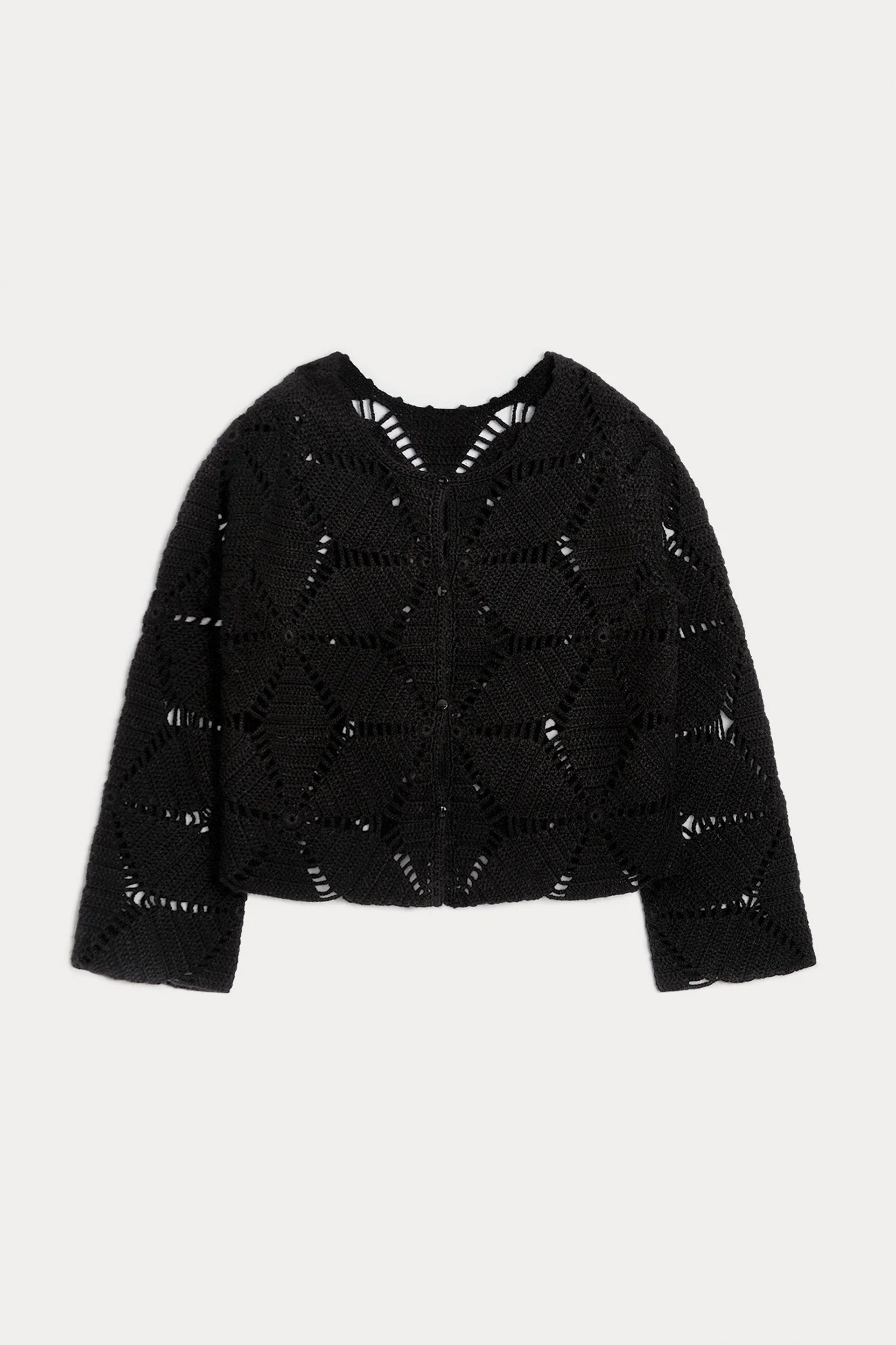 Black textured sweater on a light gray background